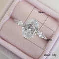 Oval Solitaire Three-Stone Ring In Polished Silver Tone view 5