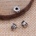 Embossed Dot Barrel Spacer Bead in Antique Bronze and Antique Silver Metal view 2