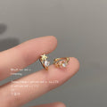 Gold-Tone Mini Star Clear Stone Huggie Hoop Earrings view 2