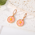 Gold Tone Round Daisy Resin Huggie Drop Earrings in Six Colors view 7