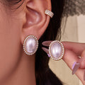Oval Shell Pearl Zircon Halo Studs And Pave Ear Cuffs view 2