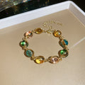 Gold Oval Multicolor Resin Cabochon Bracelet and Necklace view 6