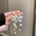 White Floral Pearl and Crystal Chain Drop Earrings view 6