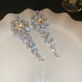 Silver Tone Crystal Geometric Drop Stud Earrings With Decorative Metal Accents view 6