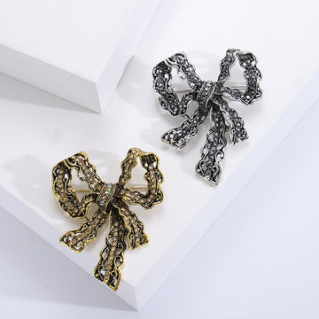 Filigree Rhinestone Bow Brooch Silver or Antique Gold