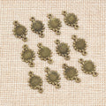 Double Loop Sunflower Connector Charms in Antique Bronze view 2