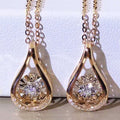 Gold Teardrop Open Pendant Necklace Dancing Clear Stone view 2