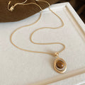 Brown Stone Style Pendant Necklaces in Four Distinct Designs view 7