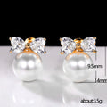 Gold Tone Bow and Pearl Look Stud Earrings Jewelry Pair view 5