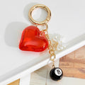 Translucent Red Heart White Bow Charm Gold-Tone Keychain view 1