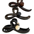 Gunmetal Tone Sculptural Loop Hair Claw With Large Round Bead Detail view 5