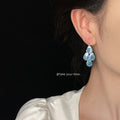 Silver Tone Blue Teardrop Panel Cluster Hook Earrings view 3