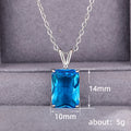Silver Tone Blue Emerald Cut Four Claw Pendant Necklace view 5