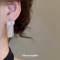 Pearl Bow and Chain Tassel Earrings Statement Jewelry Design view 3