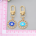 Gold Tone Crystal Openwork Round Evil Eye Clip Keychains in Five Colors view 4