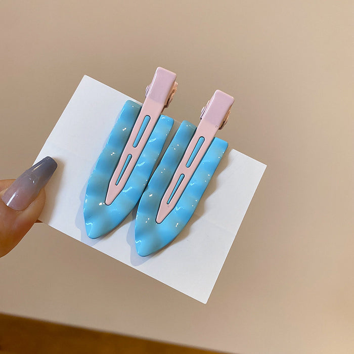 Pair Of Blue Painted Triangle Duckbill Hair Clips With Pink Backs