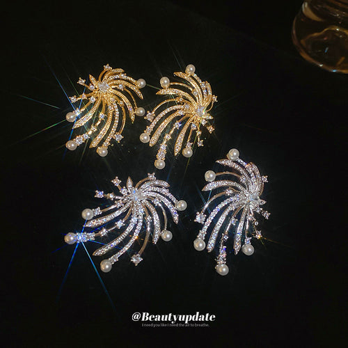 two tone firework fringe stud earrings displayed from a second angle