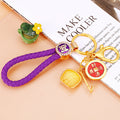 Gold Tone Fortune Pouch and Red Medallion Keychains with Braided Loops view 2