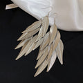 Layered Metal Leaf Tassel Hook Earrings in Three Tones view 6