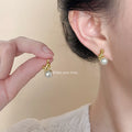 Gold Tone Cat And White Pearl Like Ball Stud Earrings view 2