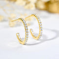 Gold Tone Open Hoop Earrings With Rows of Clear Stones view 1