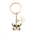 Gold Tone Butterfly Skull and Sakura Flower Clip Keychains view 5