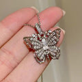 Gold and Silver Tone Filigree Butterfly Necklaces Polished Jewelry Accessory view 1