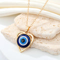Heart Outline Blue Evil Eye Pendant Necklaces in Two Finishes view 5
