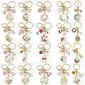 Seventeen Rabbit Flower and Carrot Metal Keychain Designs view 1