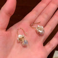 Gold Tone White Flower Crystal Drop Hook Earrings With Decorative Details view 4