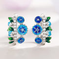 Silver Tone Blue Flower Green Leaf Huggie Earrings view 3