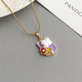 Gold Tone Shield Floral Pendant Necklace in Green Purple or Pink view 4