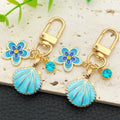 Three-Color Shell Flower and Rhinestone U Clip Keychain Collection view 2