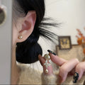 Butterfly Faux Pearl Drop Stud Earrings With Decorative Metal Details view 4