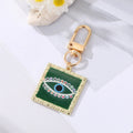 Gold Tone Square Heart and Round Evil Eye Clip Keychains view 4
