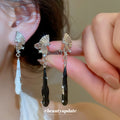 Fan and Teardrop Drop Ear Clips in Black and White Tones view 2