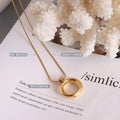 Twisted Cross Circle Ring Pendant Necklace In Gold Or Steel view 2