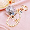 Clear Flower Globe Keychains with Pearl Loops in Six Colors plus Assorted view 6