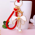 White Enamel Bow Keychain with Crystal Ribbons and Pearl Dangles view 3