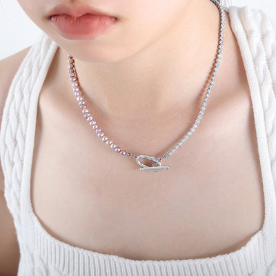 Pink pearl and zircon tennis OT clasp necklace worn on collarbone