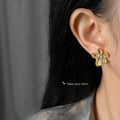 Gold Ribbon Petal Flower Stud Earrings Center Crystal Accent view 2