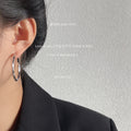 Silver Medium Twisted Hoop Earrings Latch Back Polished view 2