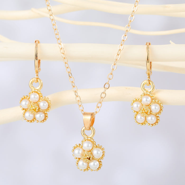 Gold Tone Faux Pearl Flower Pendant Necklace and Huggie Earrings