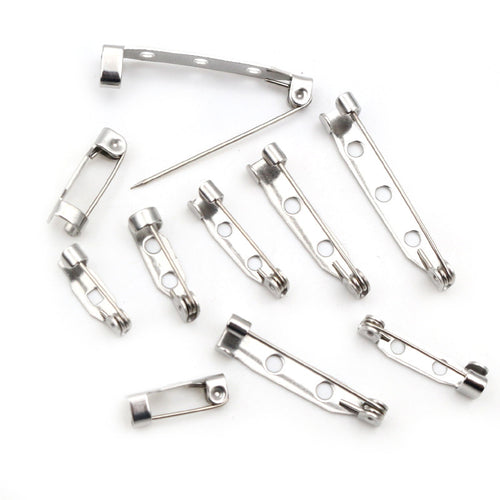 Grouped front view of stainless steel safety brooch pin backs in five lengths