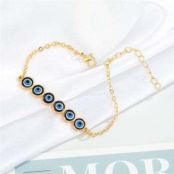 Gold Tone Multi Link Evil Eye Chain Bracelet with Six Round Charms