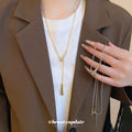 Long Teardrop Bar Pendant Necklace In Gold Tone Metal view 3