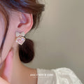 Pink Heart And Crystal Bow Stud Earrings With Polished Metal Tone Details view 3