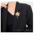 Flower Tassel Brooch in Metal with Layered Crystal Petals, Round Center, and Dangling Drop view 2