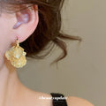 Gold Tone Butterfly Wing Hoop Earrings with Fine Openwork Texture view 3