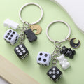 Dice Charm Keychains Featuring Black Moon Across 10 Pictured Variations view 3